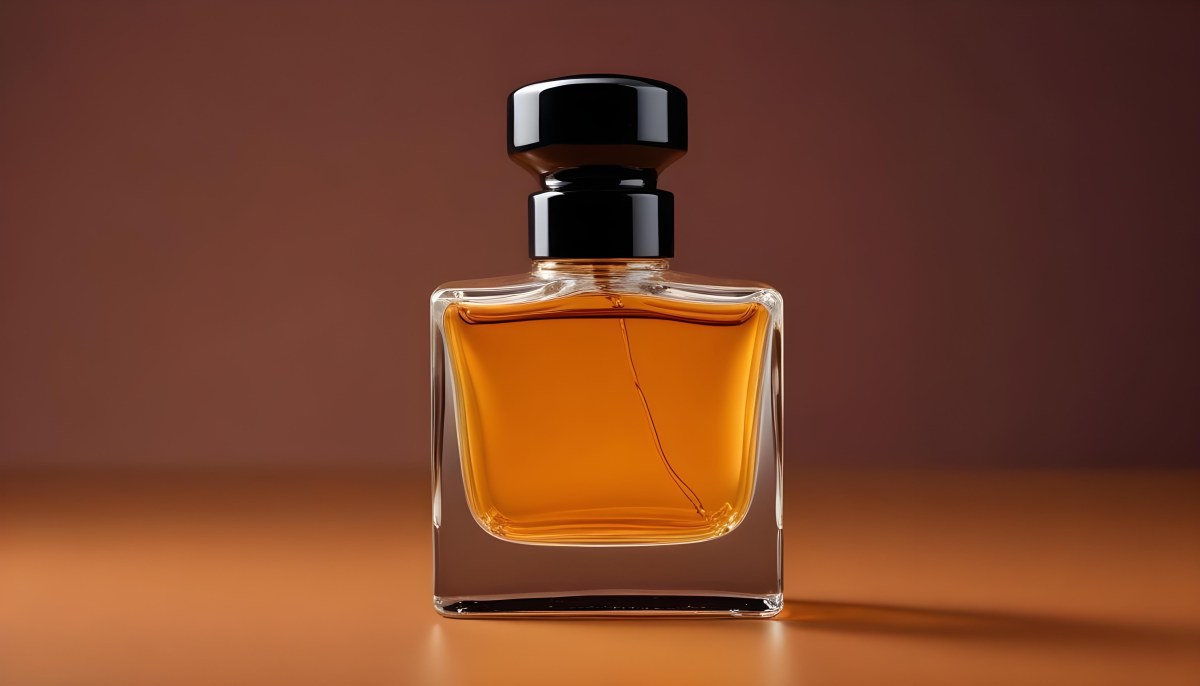 Minimal Soft Studio Light Photography A Glass Perfume Bottle With A Black Cap Filled With Amber Colored Liquid High Detail Solid Bold Color Background 7 6e79