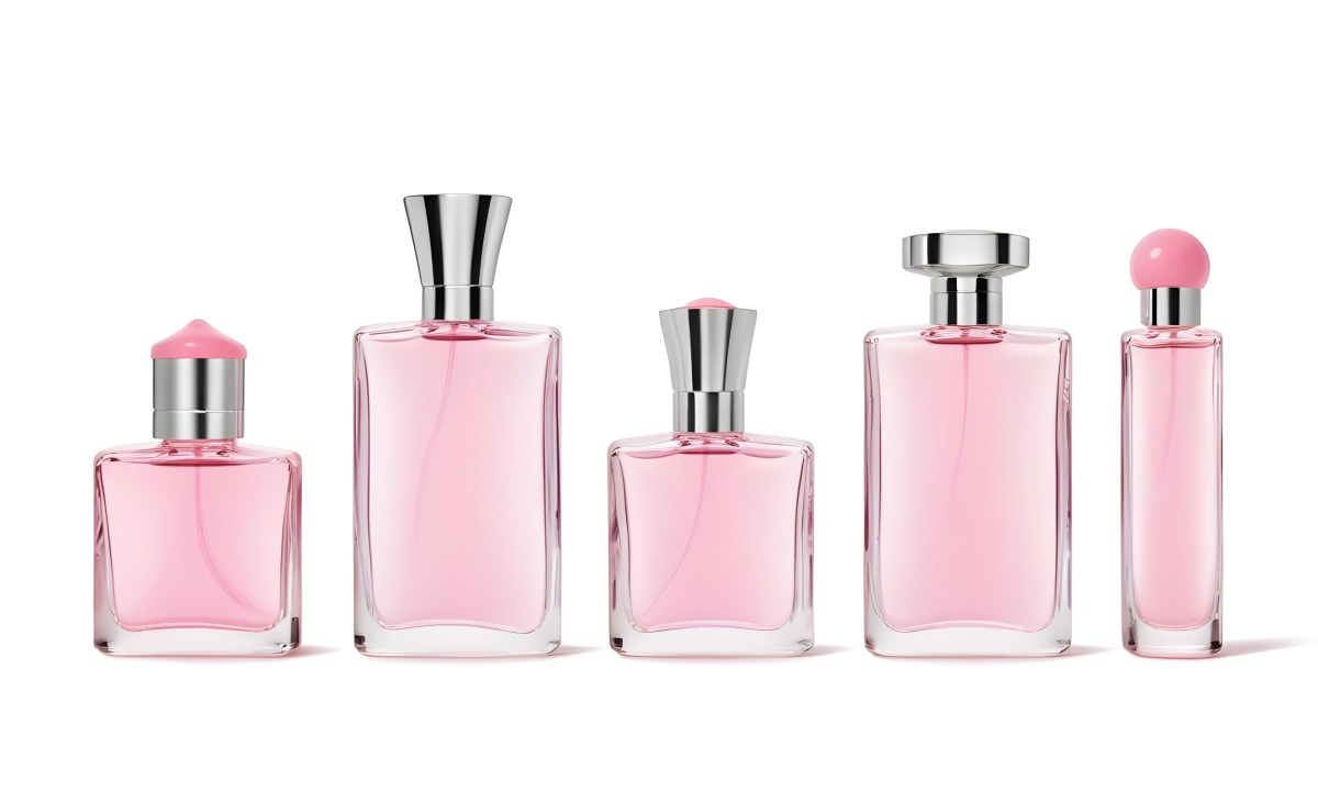 Minimal Soft Studio Light Photography Four Silver Perfume Bottles With Pink Caps Different Shapes And Sizes Arranged In A Row Clean And Minimalist Design Pink Background Elegant And Modern High Detail Solid Bold 13 88a7
