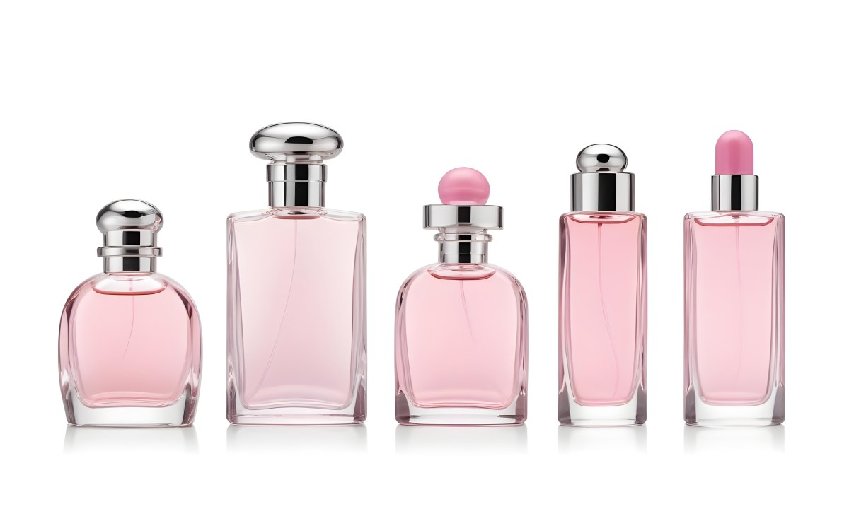 Minimal Soft Studio Light Photography Four Silver Perfume Bottles With Pink Caps Different Shapes And Sizes Arranged In A Row Clean And Minimalist Design Pink Background Elegant And Modern High Detail Solid Bold 34 1ff4