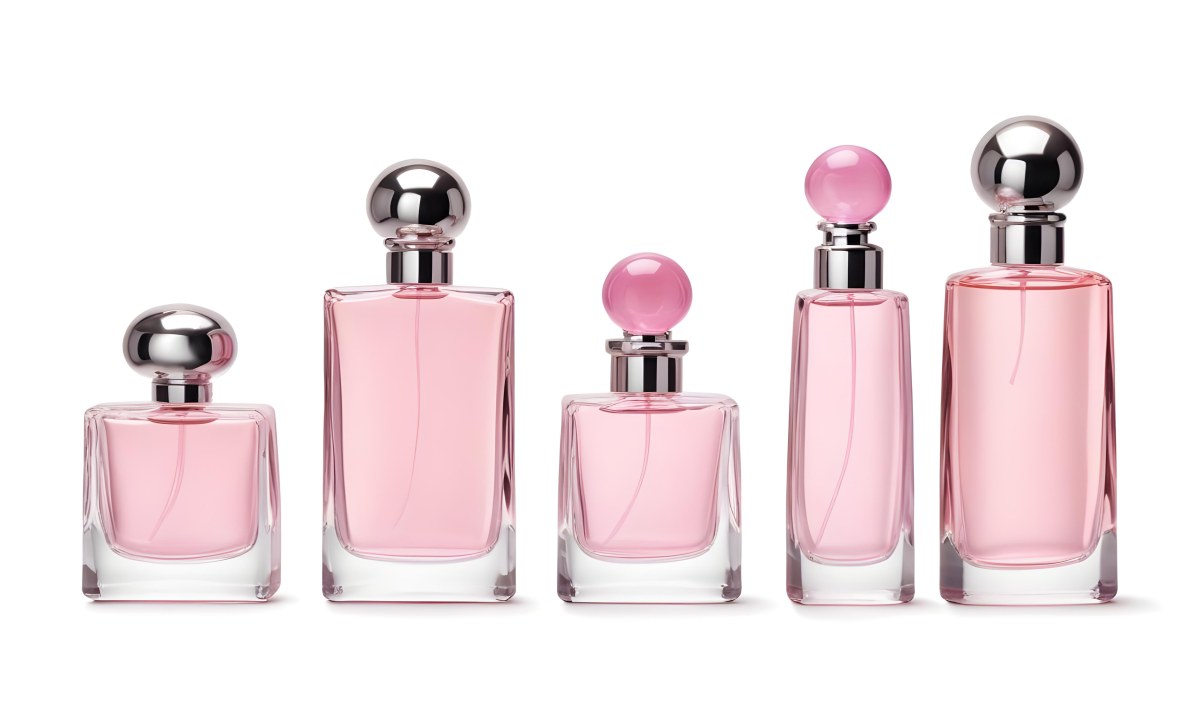 Minimal Soft Studio Light Photography Four Silver Perfume Bottles With Pink Caps Different Shapes And Sizes Arranged In A Row Clean And Minimalist Design Pink Background Elegant And Modern High Detail Solid Bold 52 17b2