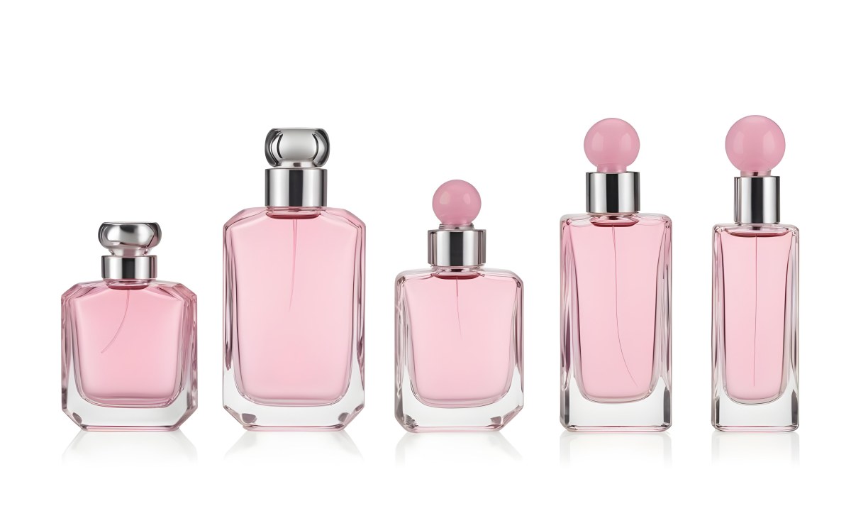 Minimal Soft Studio Light Photography Four Silver Perfume Bottles With Pink Caps Different Shapes And Sizes Arranged In A Row Clean And Minimalist Design Pink Background Elegant And Modern High Detail Solid Bold 54 710d