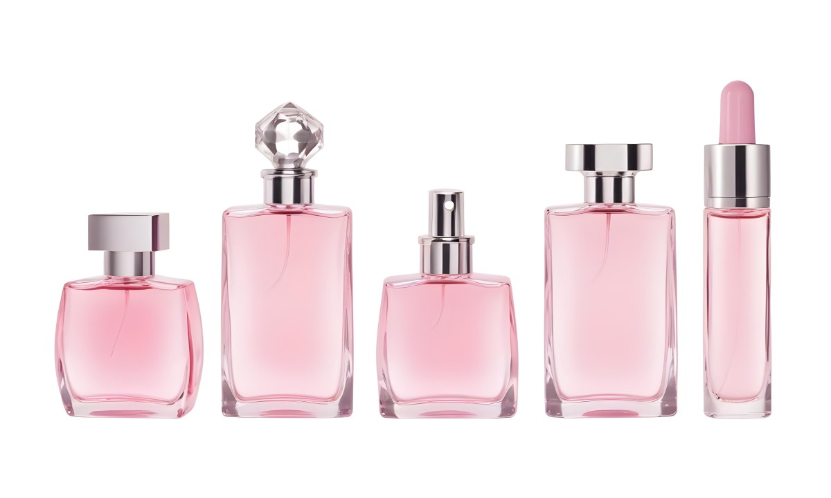 Minimal Soft Studio Light Photography Four Silver Perfume Bottles With Pink Caps Different Shapes And Sizes Arranged In A Row Clean And Minimalist Design Pink Background Elegant And Modern High Detail Solid Bold 7 Aa7c