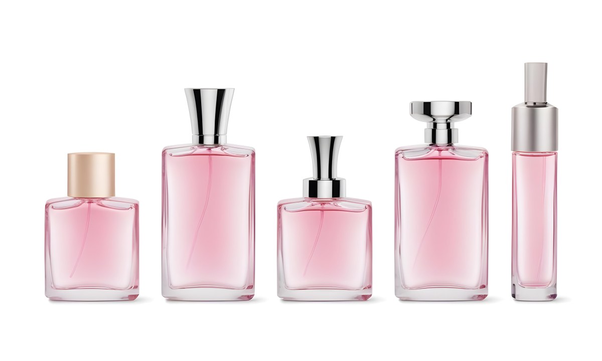Minimal Soft Studio Light Photography Four Silver Perfume Bottles With Pink Caps Different Shapes And Sizes Arranged In A Row Clean And Minimalist Design Pink Background Elegant And Modern High Detail Solid Bold 9 368b