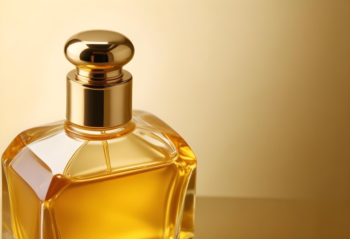 Minimal Soft Studio Light Photography Perfume Bottle With Golden Cap And Yellow Liquid Inside On A Golden Background High Detail Solid Bold Color Background 6 F74c