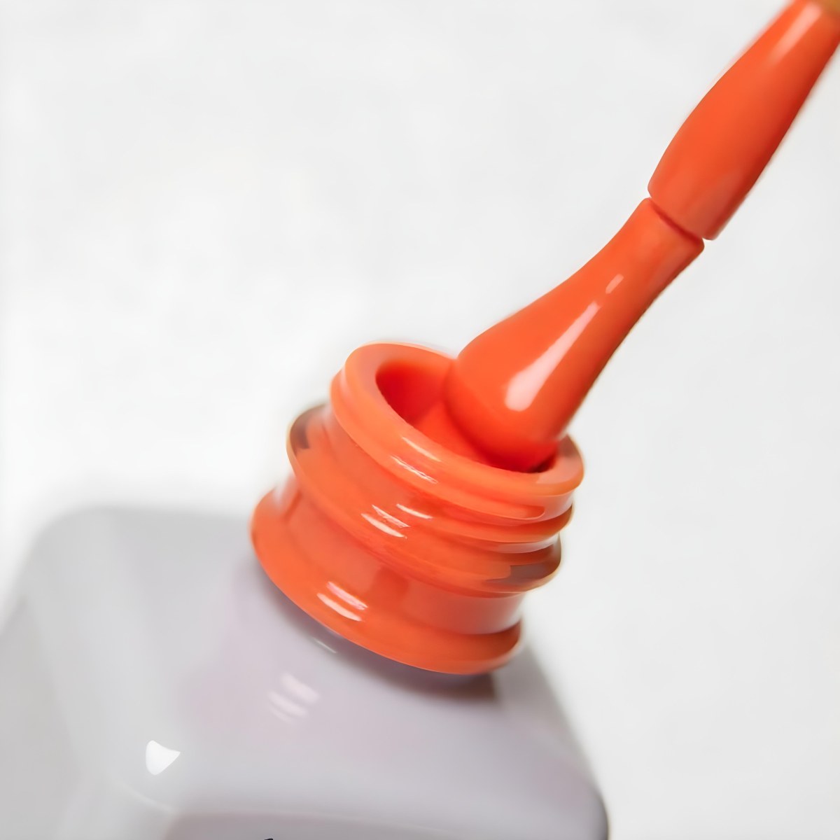 Orange Nail Polish Bottle With Brush The Bottle Is Gray The Background Is White 15 00c2