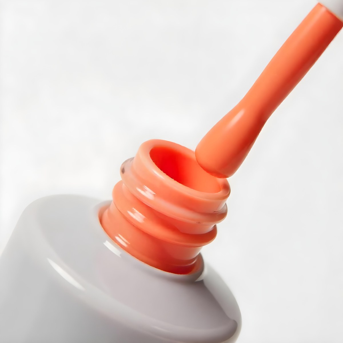 Orange Nail Polish Bottle With Brush The Bottle Is Gray The Background Is White 6 C93a