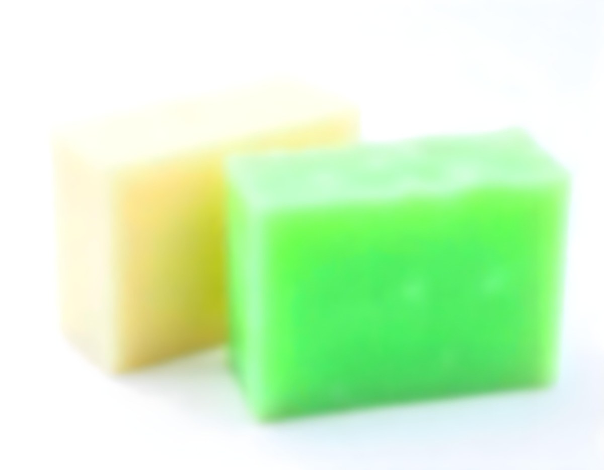 Two Bars Of Soap One White And One Green With Bubbles On Top In A White Background 16 Ee2f