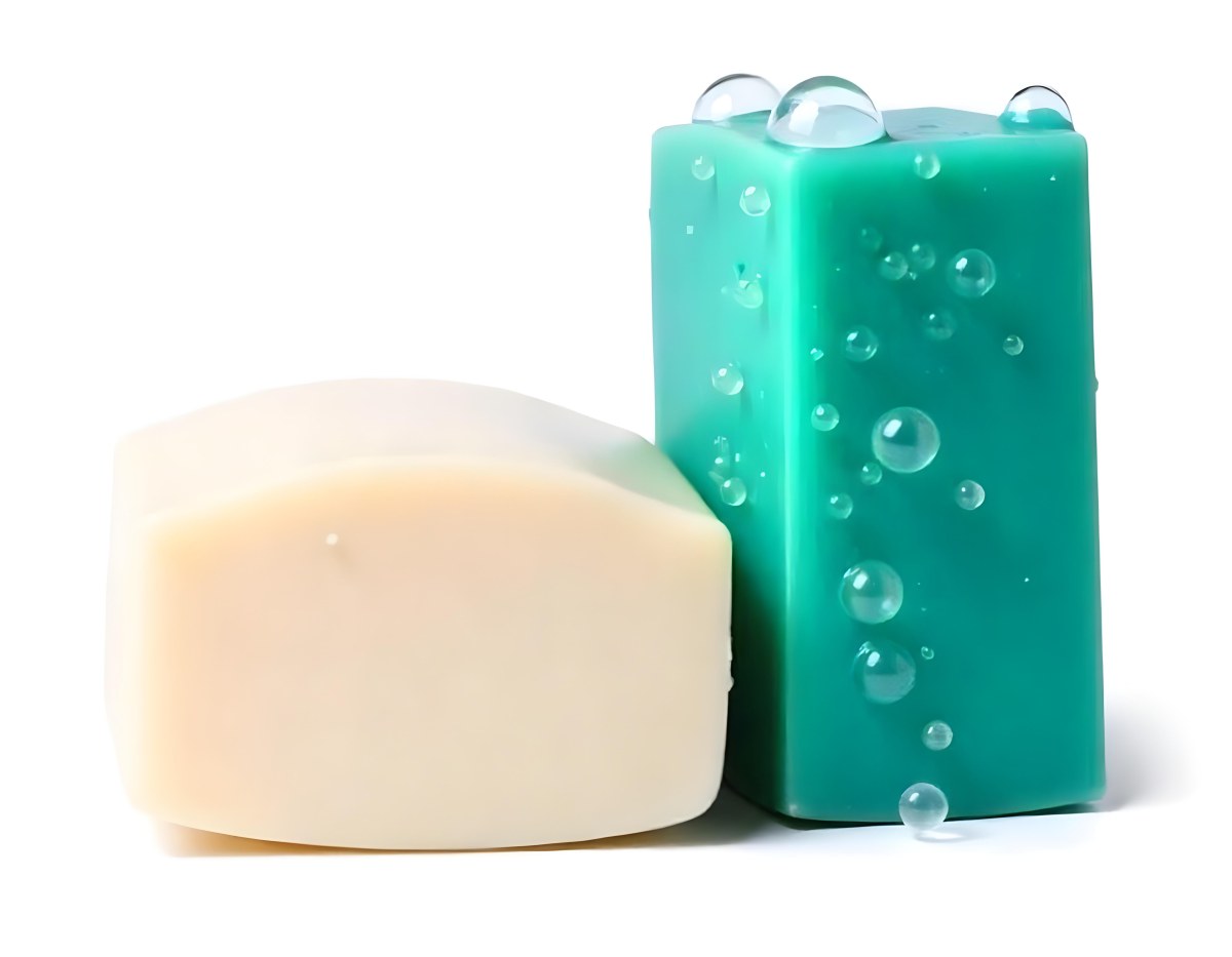 Two Bars Of Soap One White And One Green With Bubbles On Top In A White Background 3 1020