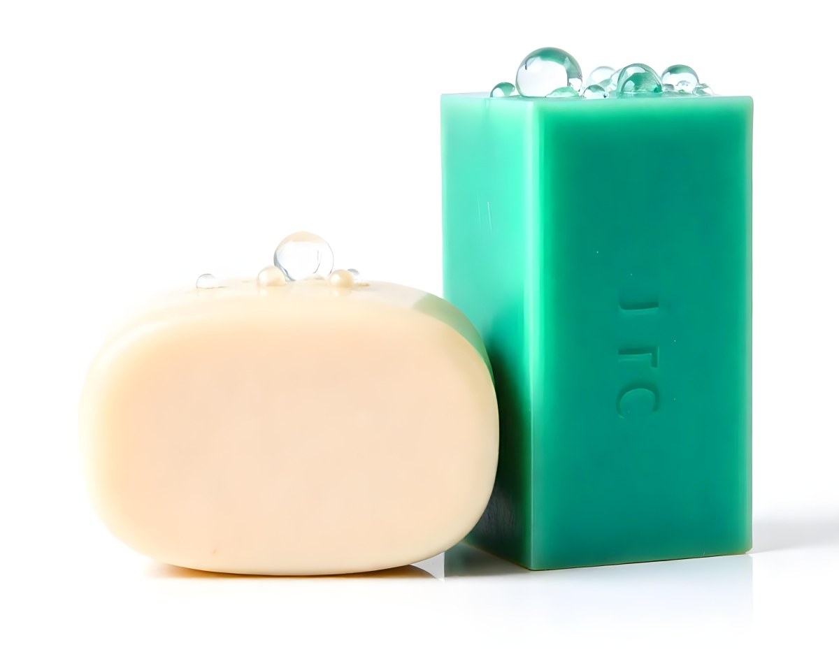 Two Bars Of Soap One White And One Green With Bubbles On Top In A White Background 8 85ed