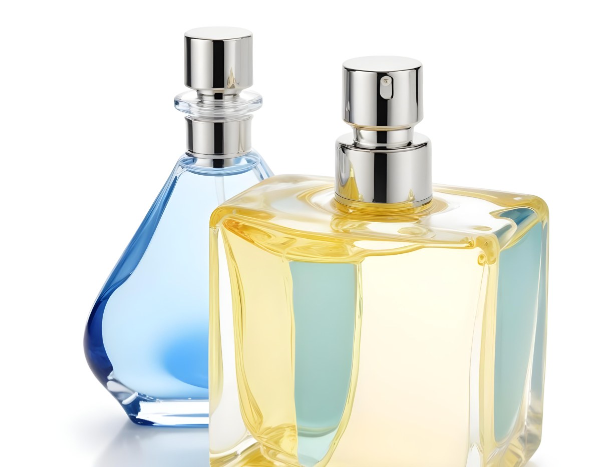 Two Perfume Bottles One With A Blue Liquid And The Other With A White Liquid White Background 22 5a86