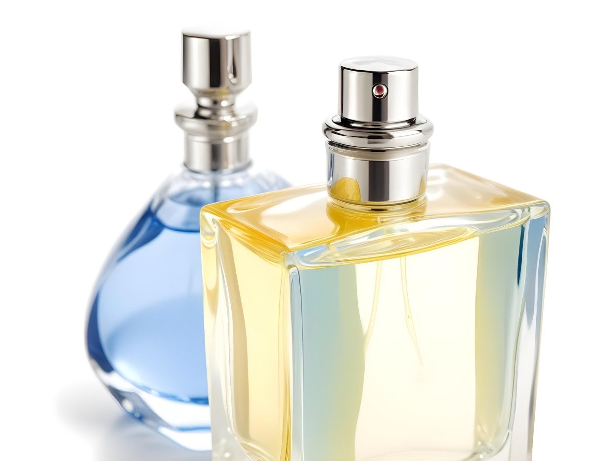 Two Perfume Bottles One With A Blue Liquid And The Other With A White Liquid White Background 27 632b