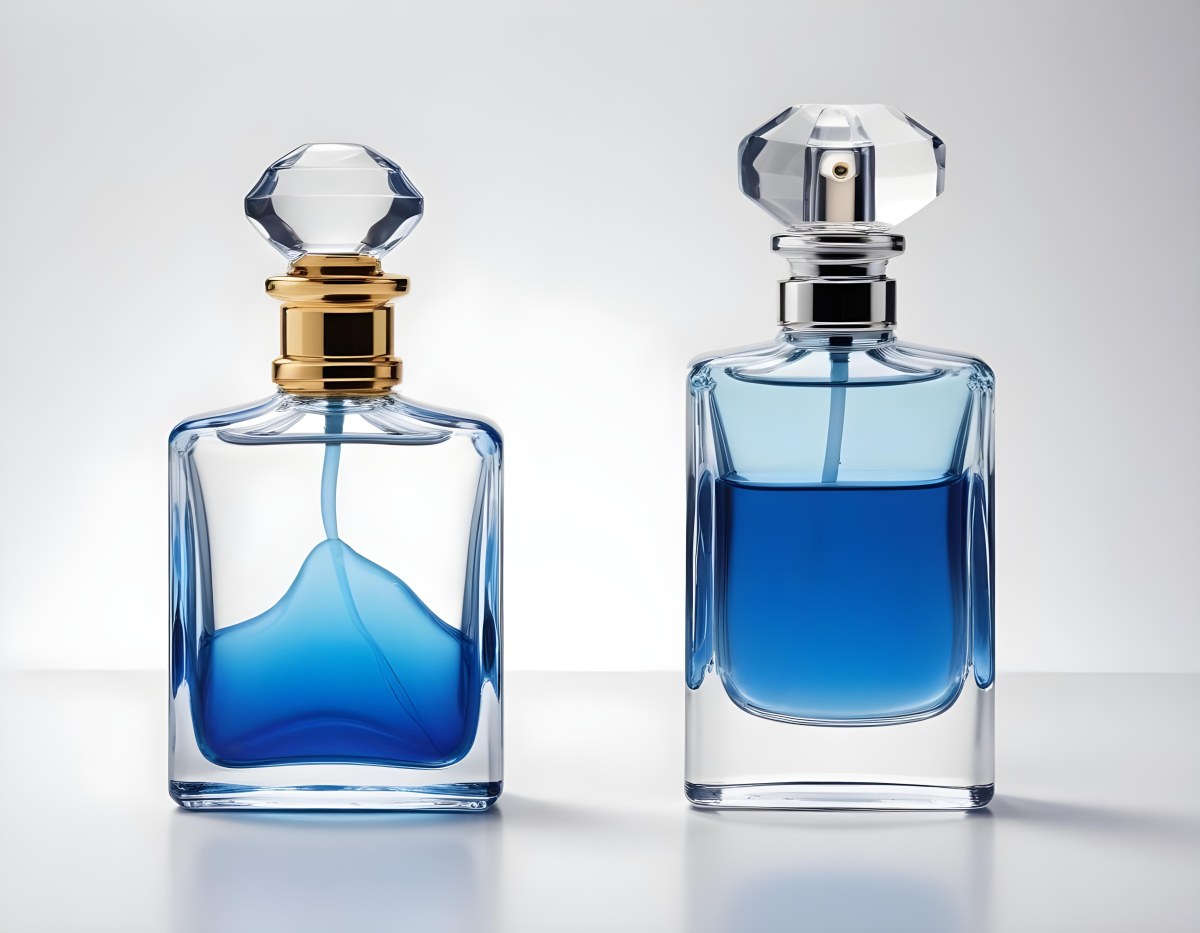 Two Perfume Bottles One With A Blue Liquid And The Other With A White Liquid White Background 6 3108