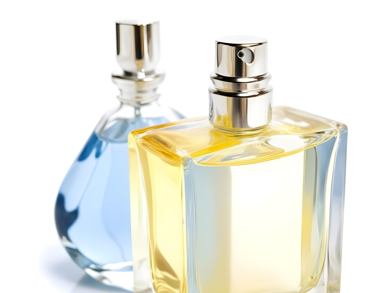 Two Perfume Bottles One With A Blue Liquid And The Other With A White Liquid White Background 9 169f