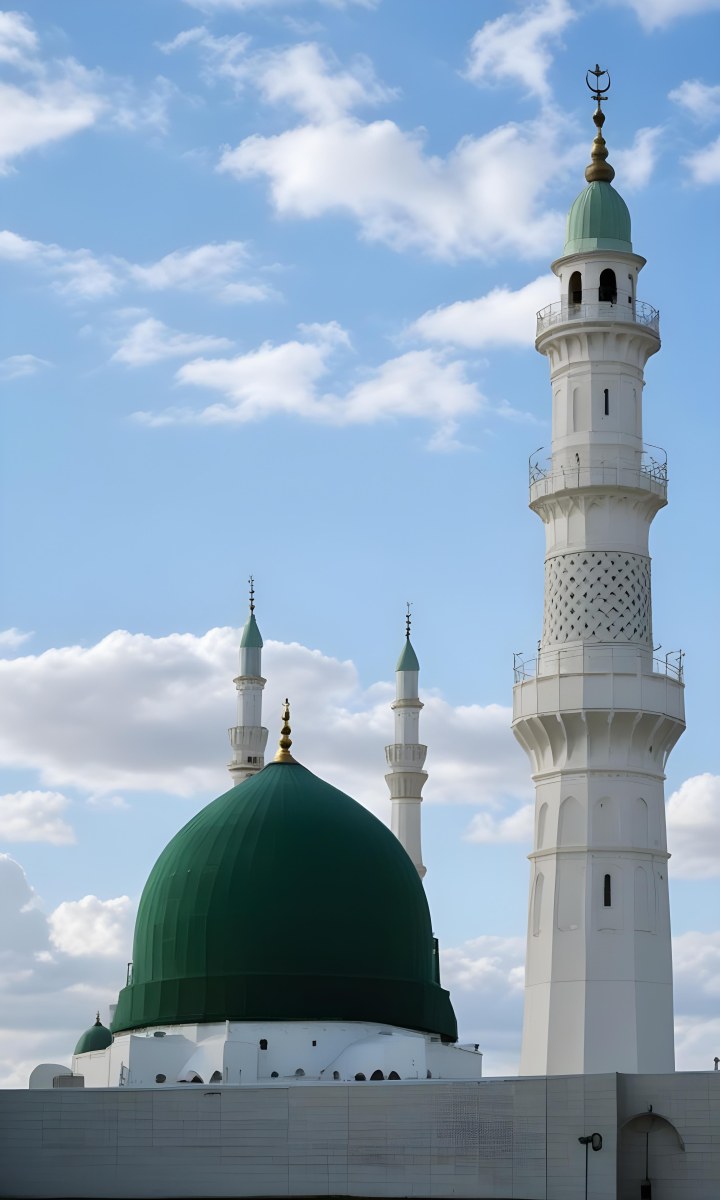 A Green Domed Mosque With A Tall Minaret Against A Blue Sky With Clouds 2 9331