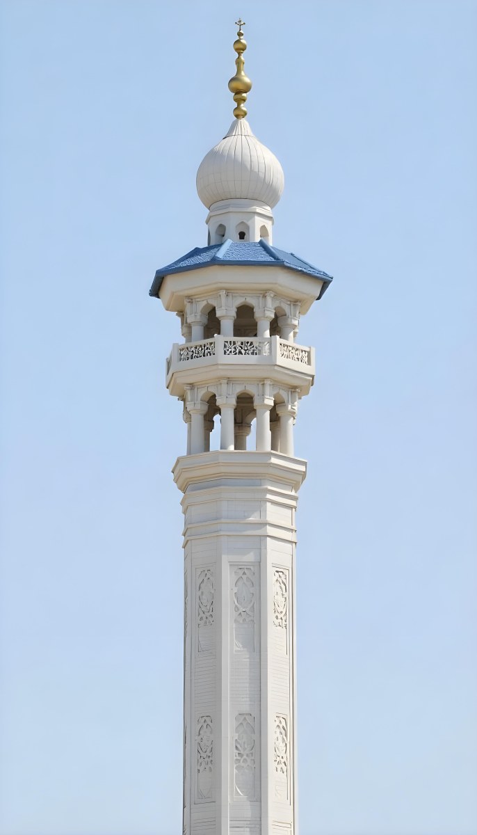 A Tall White Minaret With Blue Roof And Intricate Details Against A Clear Blue Sky Showcasing Islamic Architecture And Design 20 4f2b