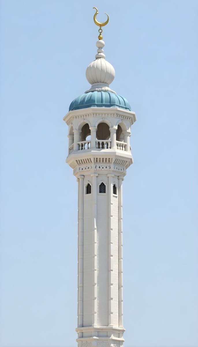 A Tall White Minaret With Blue Roof And Intricate Details Against A Clear Blue Sky Showcasing Islamic Architecture And Design 38 28a7