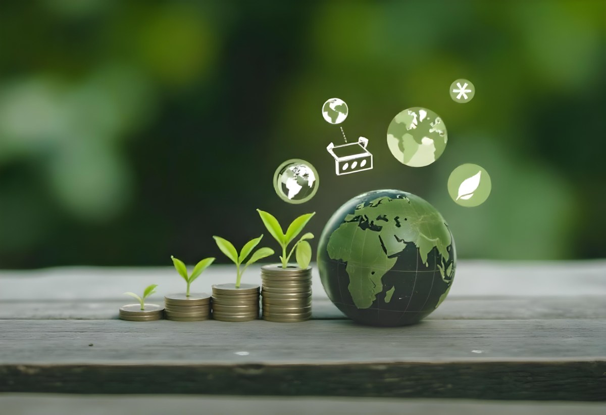 Stacks Of Coins With Plants Growing On Top A Green Earth Globe And Environmental Icons Floating Above On A Wooden Surface With A Blurred Green Background 21 16f7