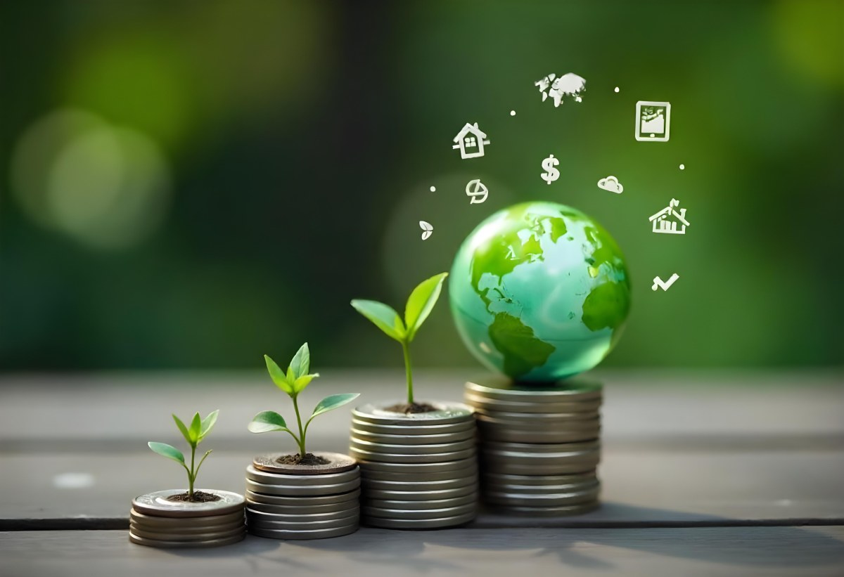 Stacks Of Coins With Plants Growing On Top A Green Earth Globe And Environmental Icons Floating Above On A Wooden Surface With A Blurred Green Background 25 91fa