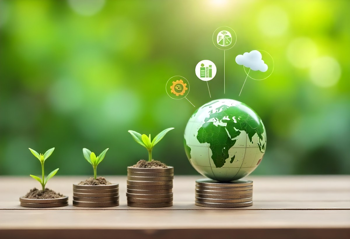 Stacks Of Coins With Plants Growing On Top A Green Earth Globe And Environmental Icons Floating Above On A Wooden Surface With A Blurred Green Background 7 42a6