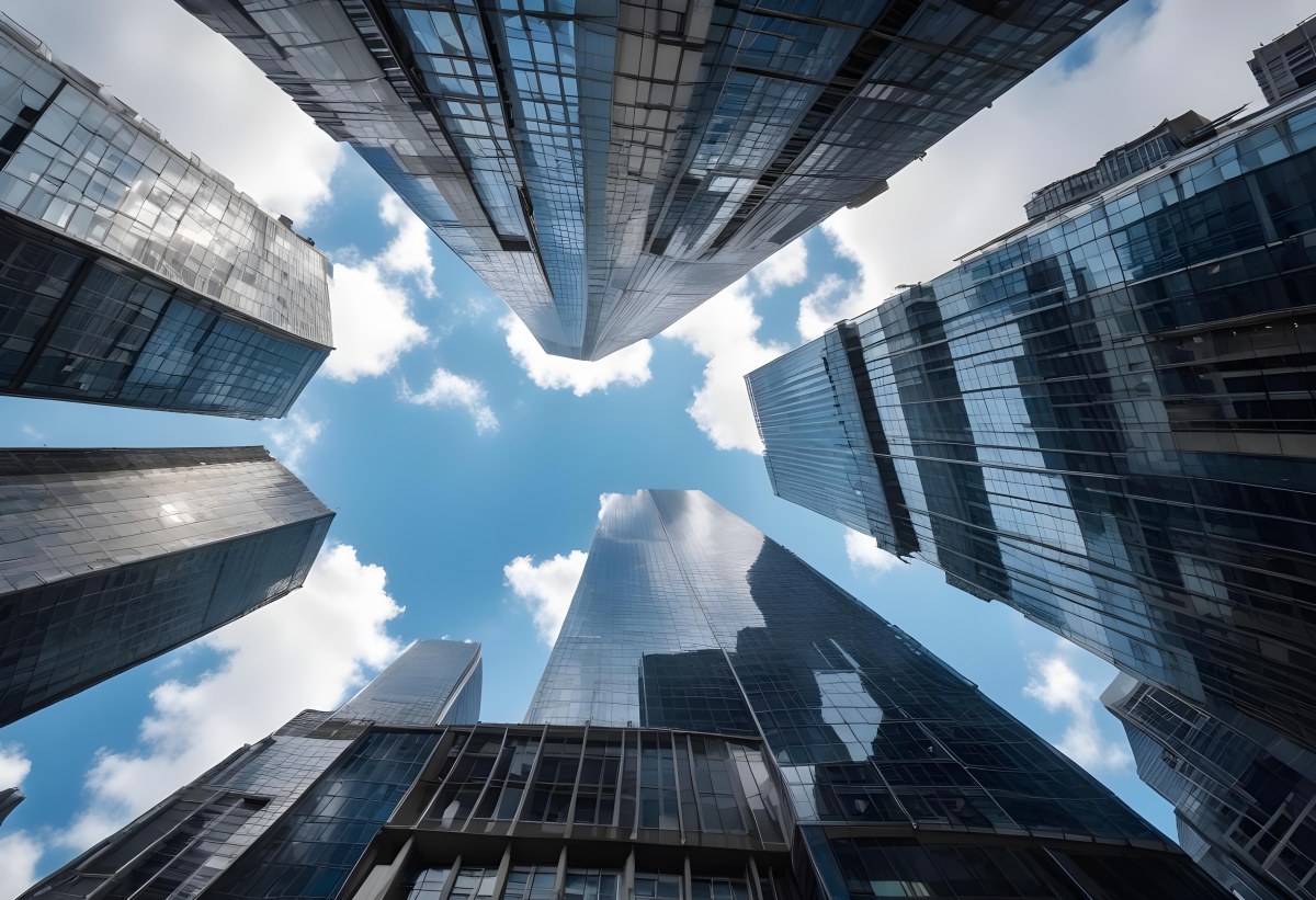 Worm S Eye View Of Modern Skyscrapers With Glass And Steel Facades Reaching Towards A Blue Sky With Scattered Clouds Creating A Sense Of Urban Grandeur 7 0138