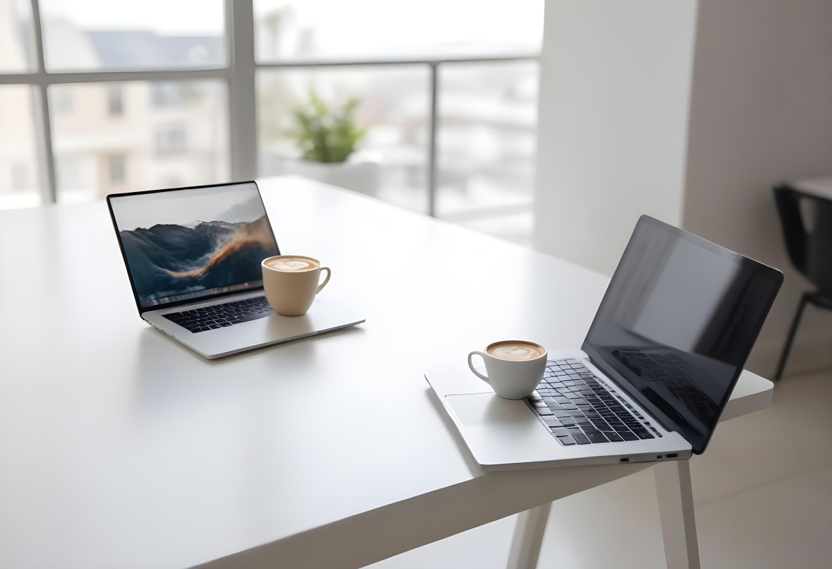 A Laptop And A Cup Of Coffee On A White Table In A Bright Environment With A Blurred Background 15 34e9