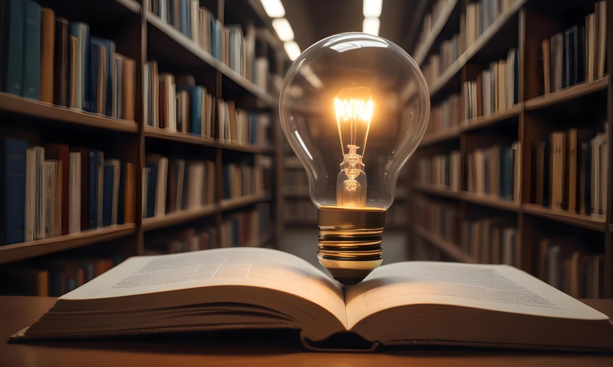 A Light Bulb On Top Of An Open Book Library In The Background With Many Books On The Shelves Warm Light Knowledge Concept 3 5921