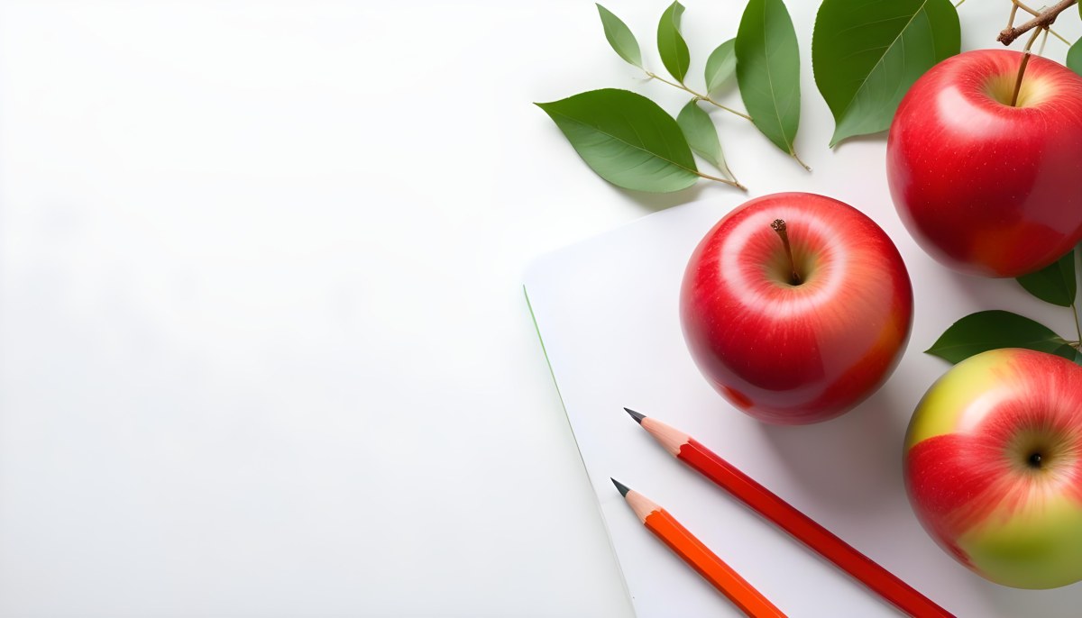 A Red Apple Pencils And A Notebook On A White Background With Green Leaves 3 69b6
