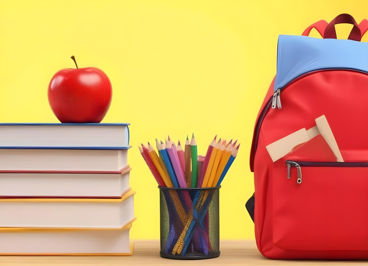 A Red Apple Stacks Of Books A Pencil Holder With Colored Pencils And A Red Backpack On A Yellow Background 18 9238