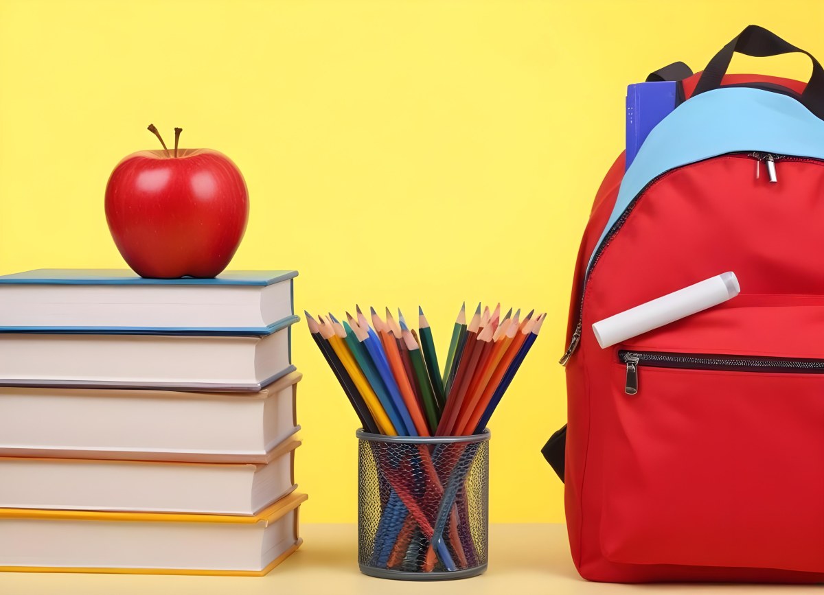 A Red Apple Stacks Of Books A Pencil Holder With Colored Pencils And A Red Backpack On A Yellow Background 21 1aaa