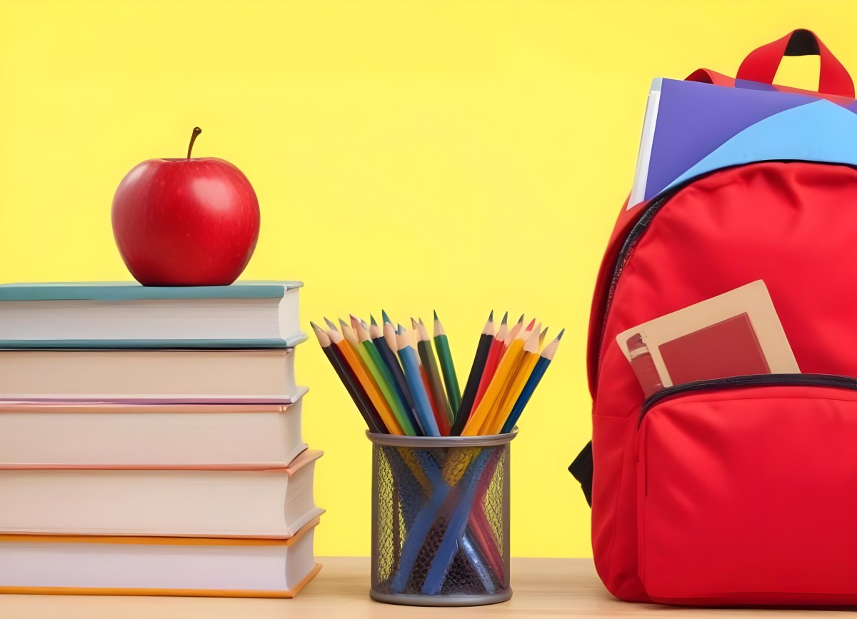 A Red Apple Stacks Of Books A Pencil Holder With Colored Pencils And A Red Backpack On A Yellow Background 23 Be06