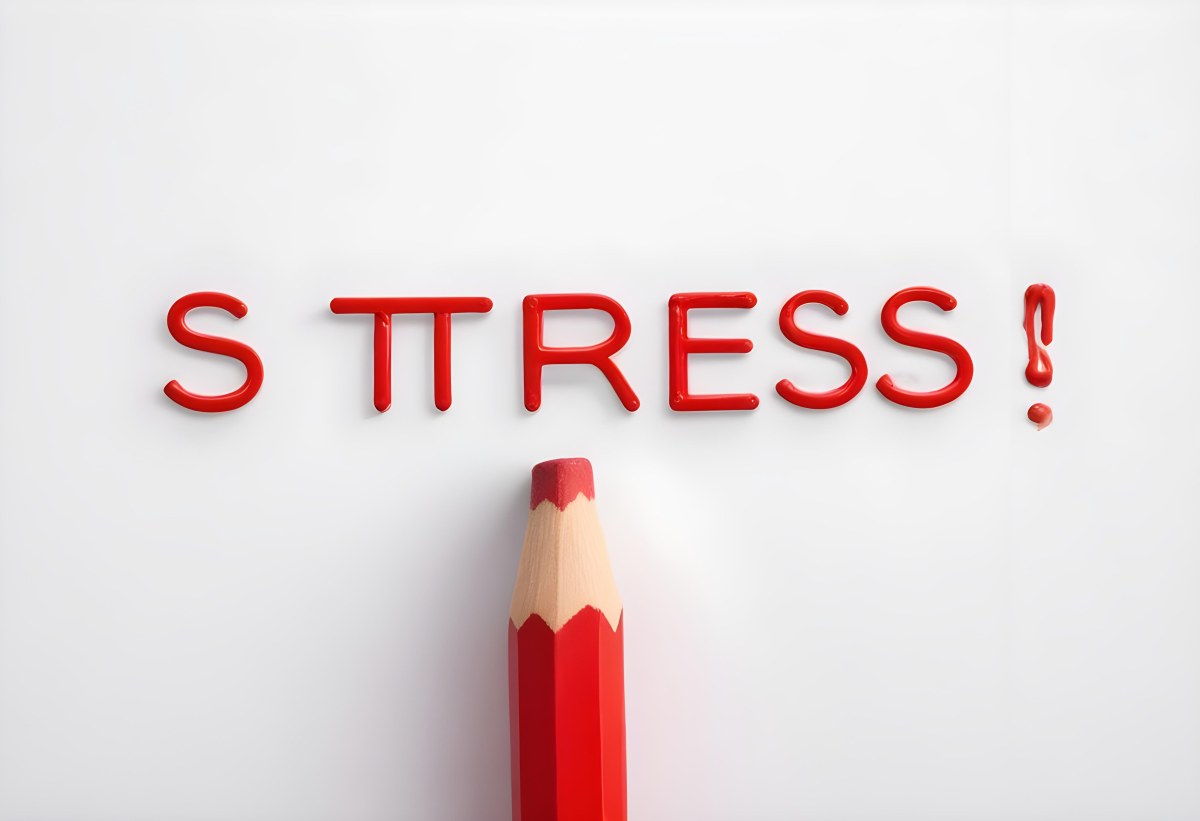 A Red Pencil Writing The Word Stress On A White Background 3 290a A4d7