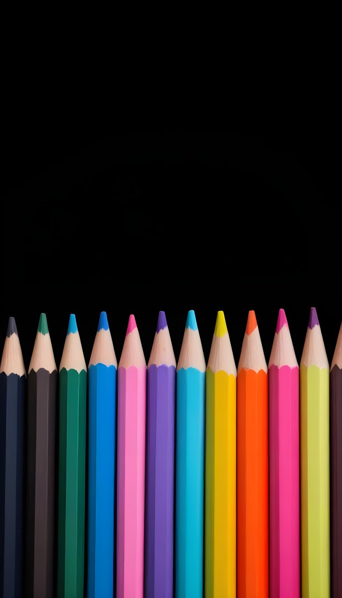 A Row Of Colored Pencils Arranged Neatly On A Black Background The Pencils Display A Variety Of Vibrant Colors Including Red Green Blue Purple Orange And Pink With Their Sharpened Tips Facing Upwards 10 0785