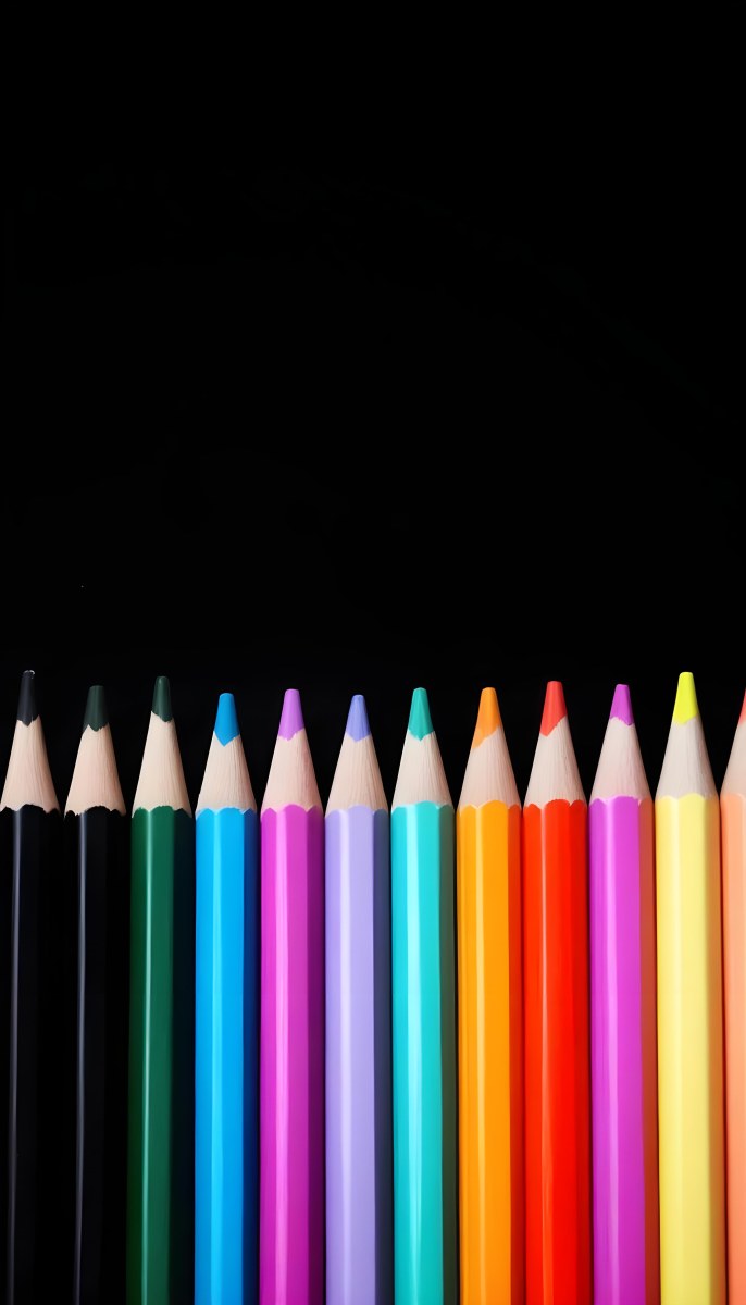 A Row Of Colored Pencils Arranged Neatly On A Black Background The Pencils Display A Variety Of Vibrant Colors Including Red Green Blue Purple Orange And Pink With Their Sharpened Tips Facing Upwards 16 B24e