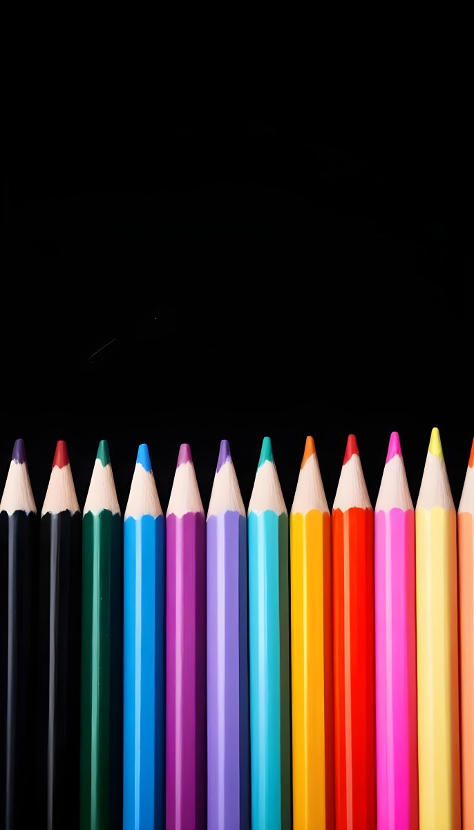 A Row Of Colored Pencils Arranged Neatly On A Black Background The Pencils Display A Variety Of Vibrant Colors Including Red Green Blue Purple Orange And Pink With Their Sharpened Tips Facing Upwards 19 83d4