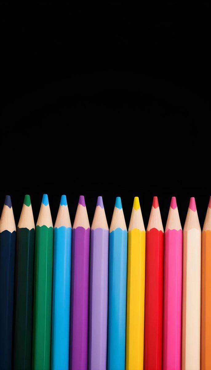 A Row Of Colored Pencils Arranged Neatly On A Black Background The Pencils Display A Variety Of Vibrant Colors Including Red Green Blue Purple Orange And Pink With Their Sharpened Tips Facing Upwards 8 2f68