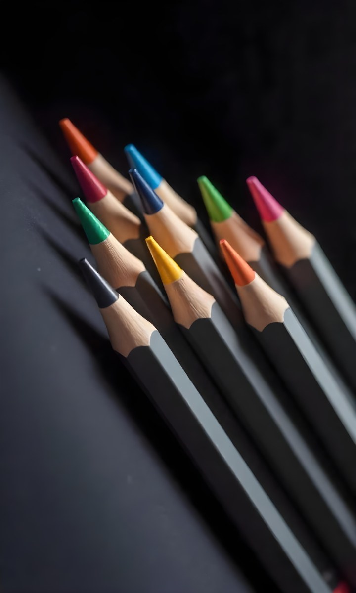 A Set Of Colored Pencils With Different Colors Arranged In A Row With A Dark Background And Soft Lighting Creating A Visually Appealing Composition 4 79b7