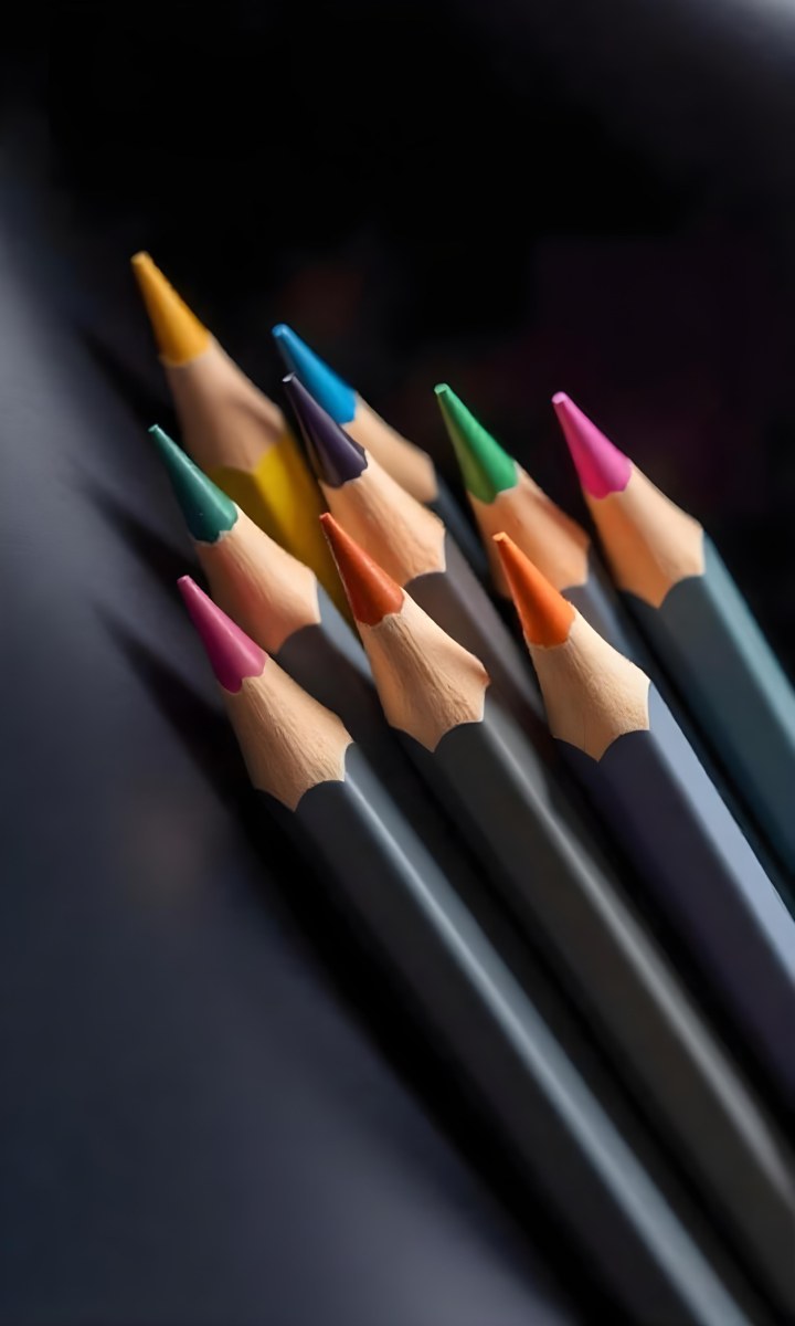 A Set Of Colored Pencils With Different Colors Arranged In A Row With A Dark Background And Soft Lighting Creating A Visually Appealing Composition 7 3c7d