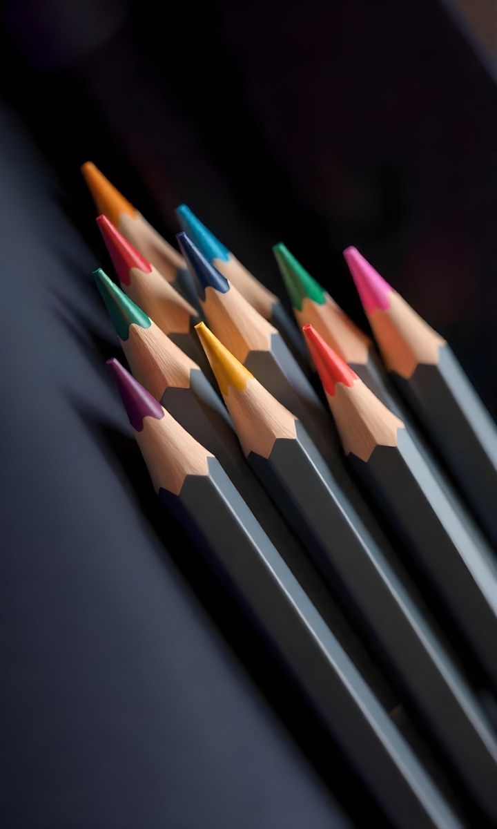 A Set Of Colored Pencils With Different Colors Arranged In A Row With A Dark Background And Soft Lighting Creating A Visually Appealing Composition 8 8f8a