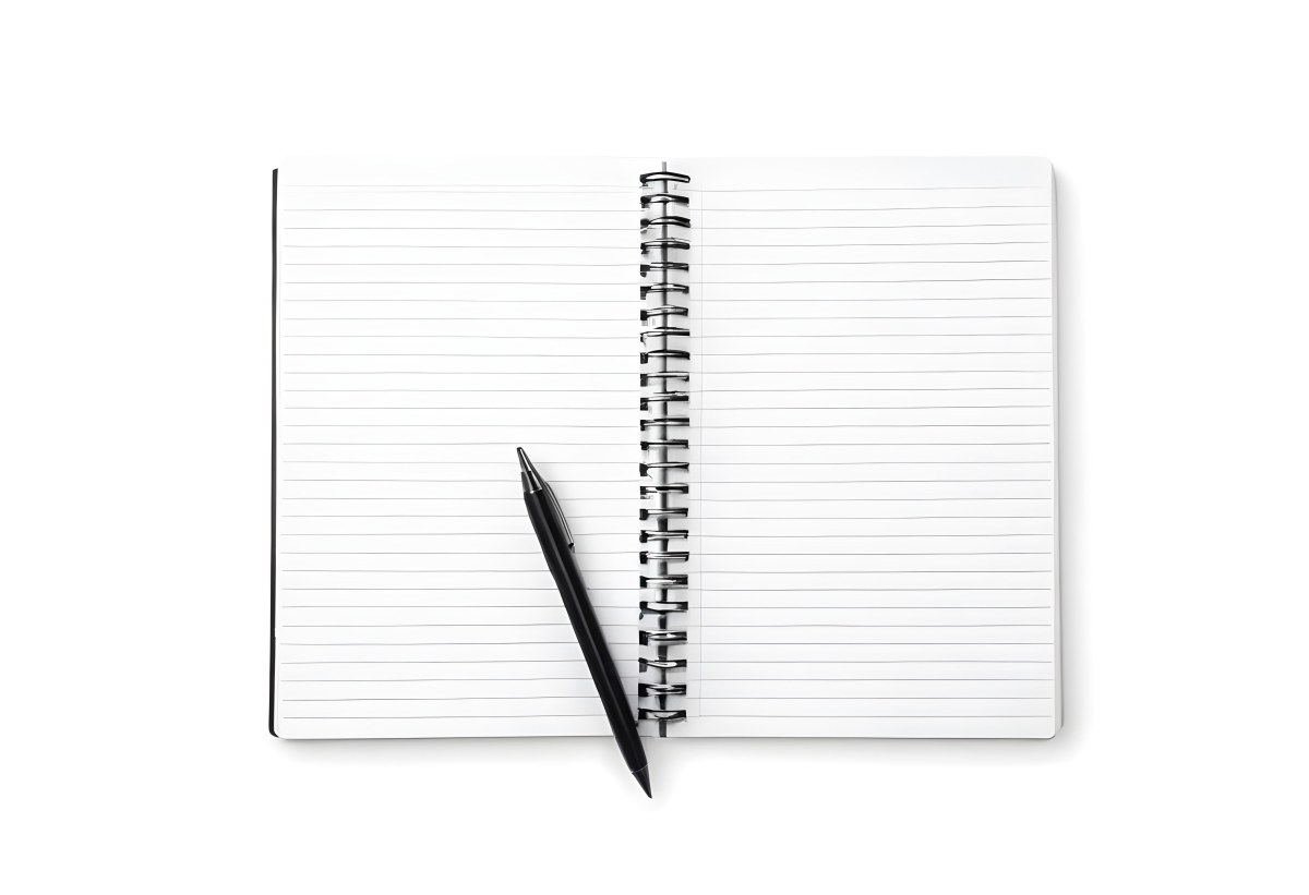 An Open Spiral Notebook With Lined Pages And A Black Pen Lying On Top Isolated On A White Background 6 98e3