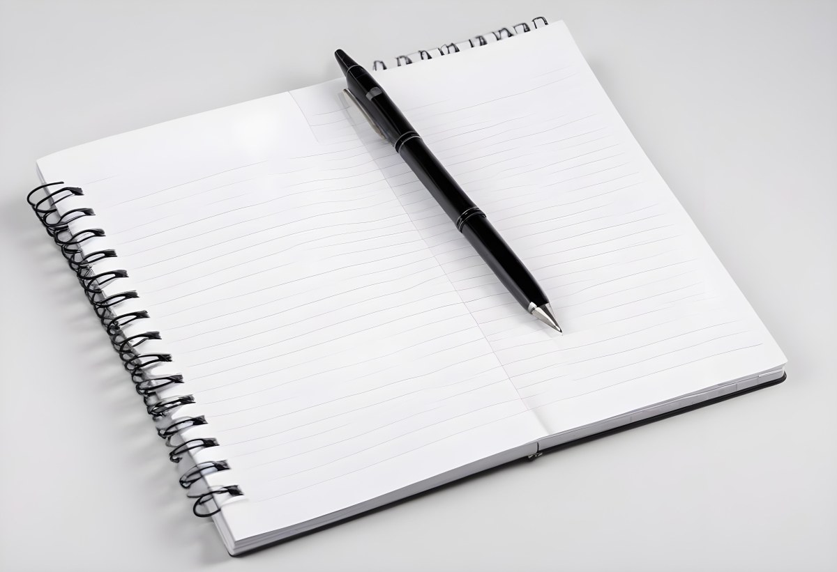 An Open Spiral Notebook With Lined Pages And A Black Pen Lying On Top Isolated On A White Background 7 Bc18