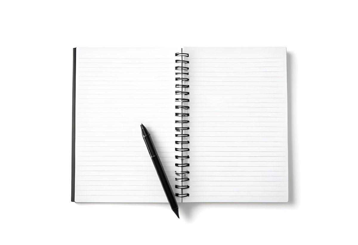 An Open Spiral Notebook With Lined Pages And A Black Pen Lying On Top Isolated On A White Background 9 E86b