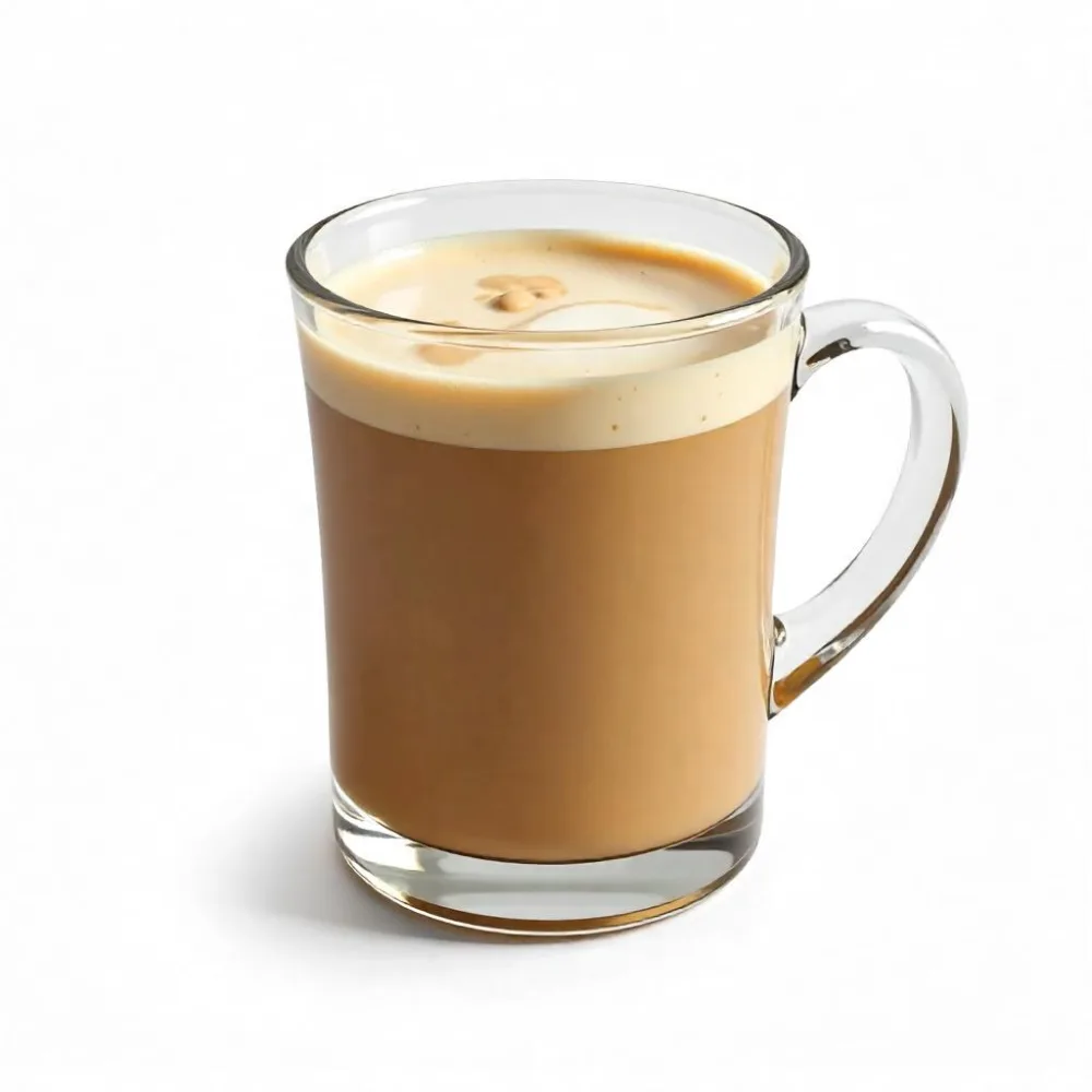 A Glass Mug Filled With A Creamy Brown Liquid Possibly Tea Or Coffee With Milk On A Plain White Background 4 4dc6