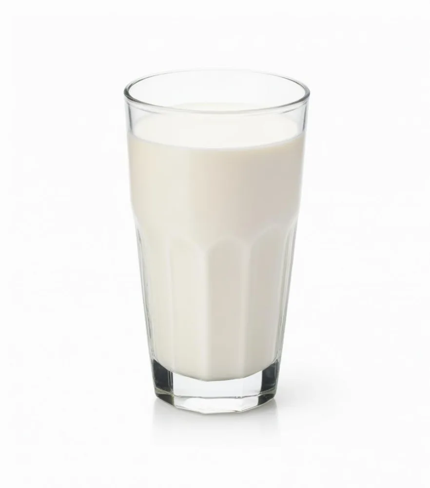 A Glass Of Fresh Creamy Milk