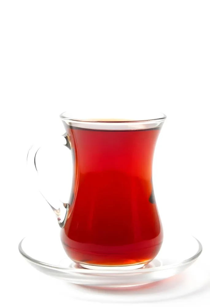 A Glass Of Red Tea On A Glass Saucer White Background 17 140c