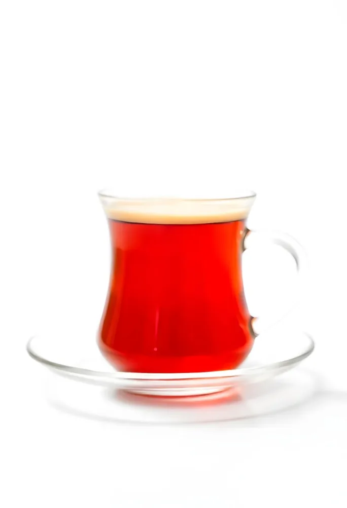 A Glass Of Red Tea On A Glass Saucer White Background 30 22b0