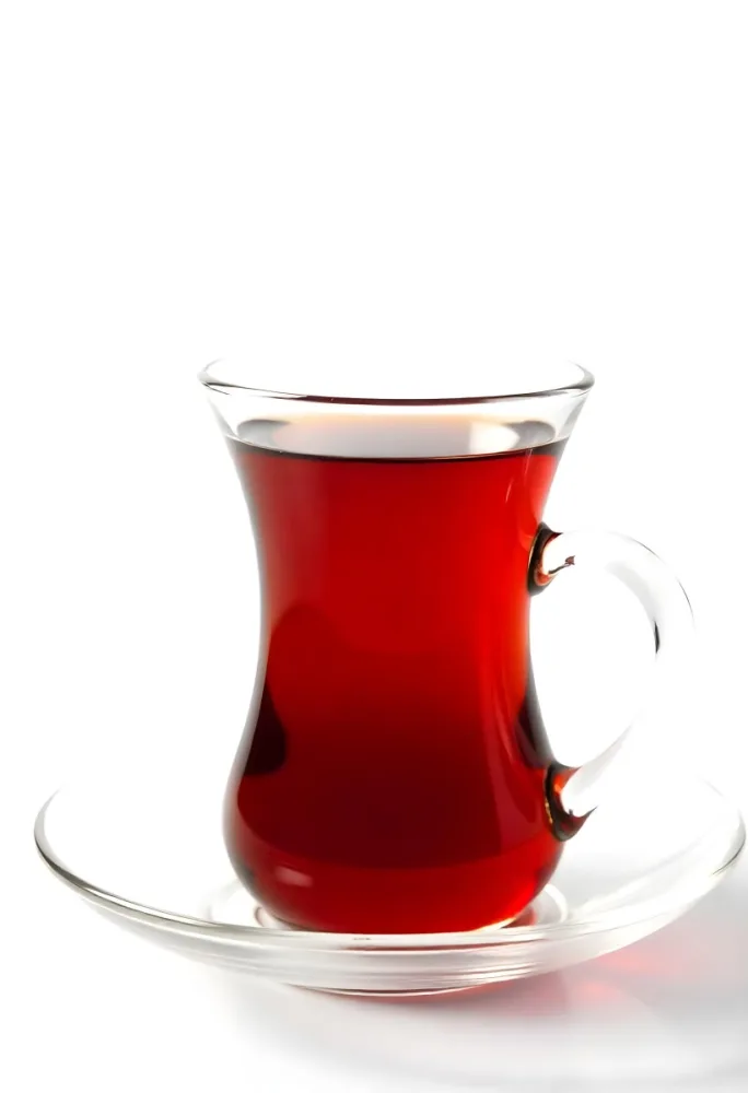 A Glass Of Red Tea On A Glass Saucer White Background 32 Ce7b