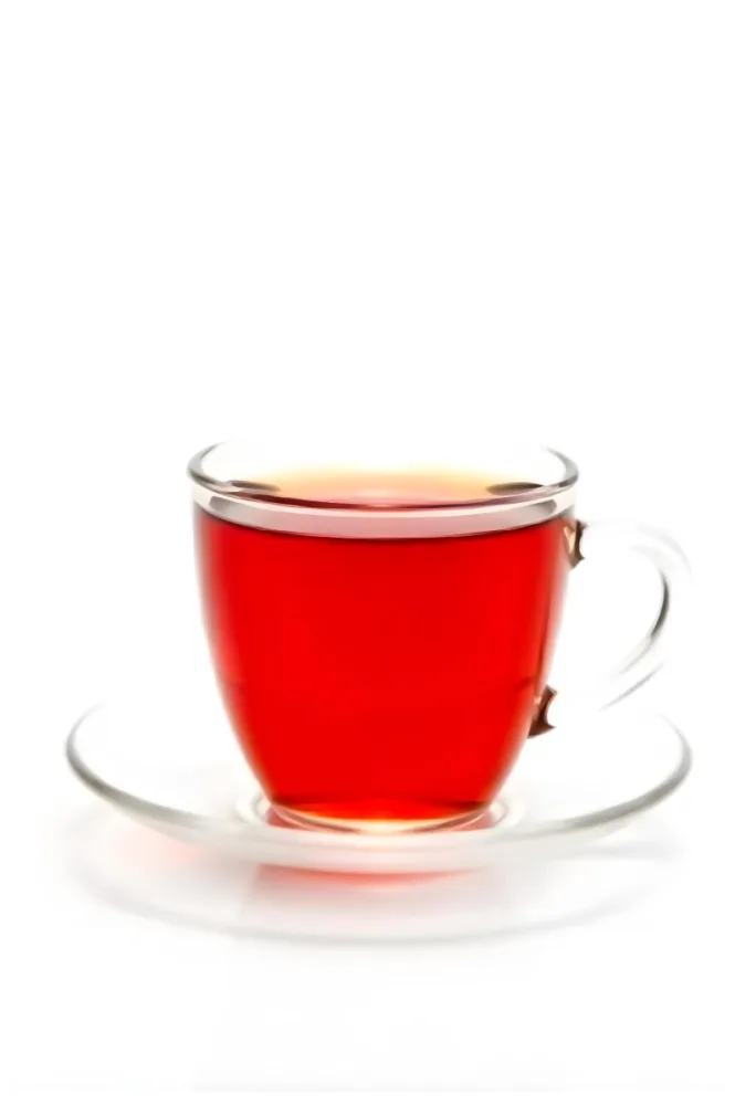 A Glass Of Red Tea On A Glass Saucer White Background 33 5fe4
