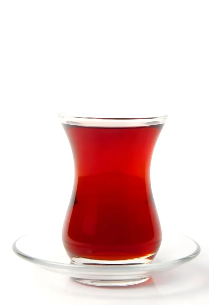 A Glass Of Red Tea On A Glass Saucer White Background 9 Eca6