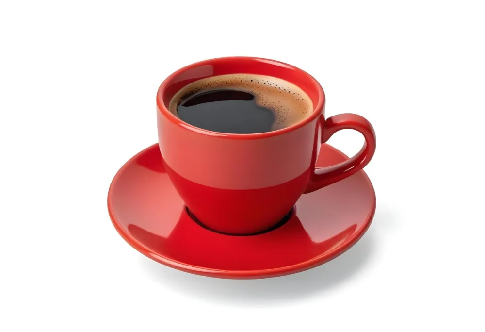 A Red Ceramic Cup Filled With A Creamy Latte With A Heart Shaped Design Made From The Foam On Top Sitting On A Matching Red Saucer 45 B4dd