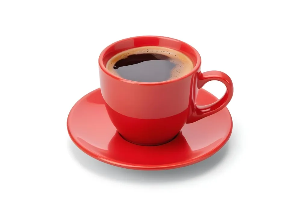 A Red Ceramic Cup Filled With A Creamy Latte With A Heart Shaped Design Made From The Foam On Top Sitting On A Matching Red Saucer 9 8e6e